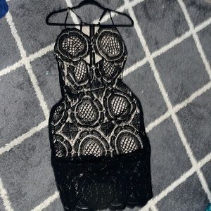 Sexy lace black dress with exposed gold zipper. Size Large